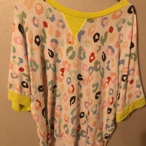 Cheetah print shirt, no tags fit like a S/M.